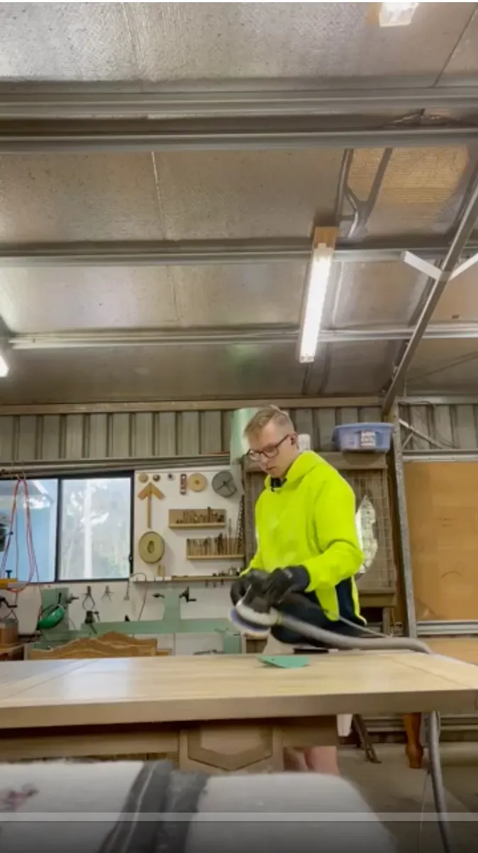 Video evidence of an apprentice sanding a timber panel